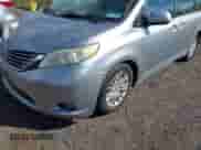 2012 Toyota Sienna XLE with VIN 5TDYK3DCXCS235154, listed as a IAAI auction lot 43366877 with 216,434 mi miles and . Bid and sale history available at DreamBid. Image 6.