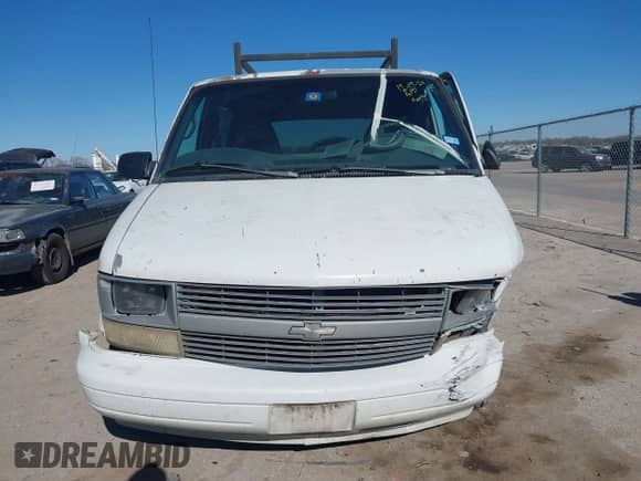 1996 Chevrolet Astro z VIN 1GNDM19W7TB121255, wystawiony jako IAAI lot #41421948 z przebiegiem Nie podano mil oraz . Historia ofert i sprzedaży dostępna na DreamBid. Obrazek 13.