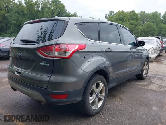 2014 Ford Escape SE z VIN 1FMCU0GX4EUD79133, wystawiony jako IAAI lot #42881509 z przebiegiem 158 715 mil mil oraz . Historia ofert i sprzedaży dostępna na DreamBid. Obrazek 4.