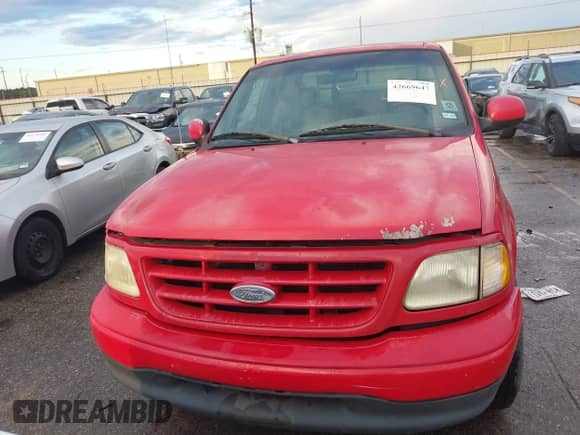 2001 Ford F-150 XL с VIN 1FTZX17291NB47096, выставлен на аукционе IAAI как лот 42669647 с пробегом Не указан миль и . История ставок и продаж доступна на DreamBid. Изображение 12.
