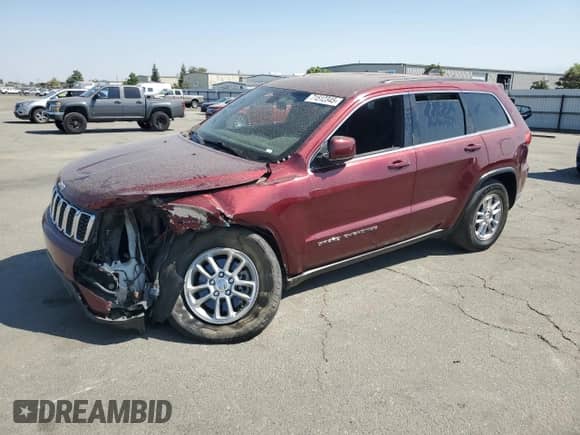 2018 Jeep Grand Cherokee Altitude with VIN 1C4RJEAGXJC513169, listed as a Copart auction lot 71512345 with 70,013 mi miles and Salvage title. Bid and sale history available at DreamBid. Image 1.