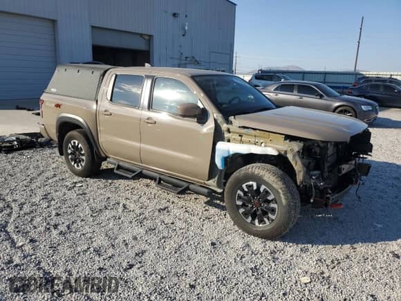 2024 Nissan Frontier Pro-4X with VIN 1N6ED1EK4RN622270, listed as a Copart auction lot 81142545 with 6,749 mi miles and Salvage title. Bid and sale history available at DreamBid. Image 4.