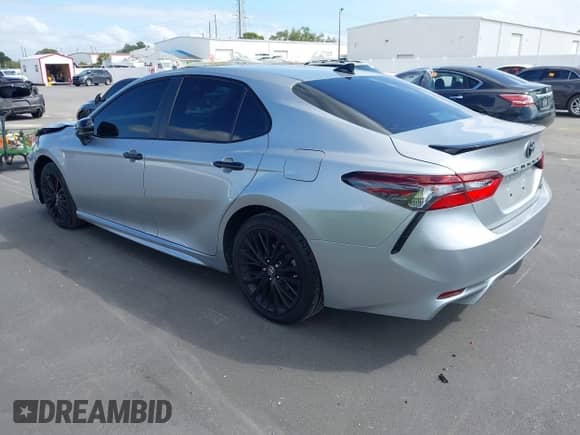 2021 Toyota Camry SE with VIN 4T1G11AK2MU445593, listed as a IAAI auction lot 43385464 with 57,907 mi miles and . Bid and sale history available at DreamBid. Image 3.