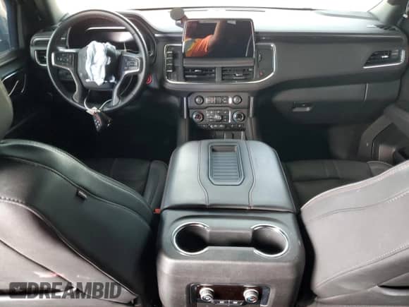 2024 Chevrolet Suburban RST z VIN 1GNSCEKD6RR128479, wystawiony jako Copart lot #71018465 z przebiegiem 48 877 mil mil oraz Szkoda całkowita • Salvage title. Historia ofert i sprzedaży dostępna na DreamBid. Obrazek 8.