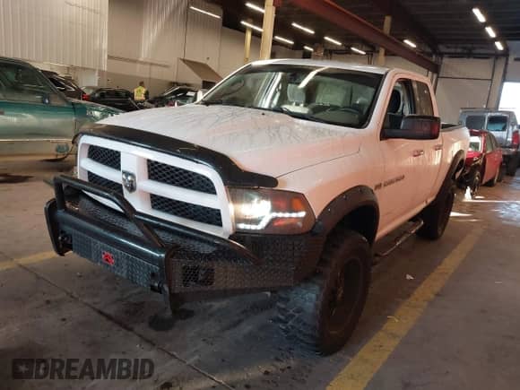 2011 Ram 1500 SLT z VIN 1D7RV1GT0BS638213, wystawiony jako IAAI lot #41255186 z przebiegiem 204 509 mil mil oraz . Historia ofert i sprzedaży dostępna na DreamBid. Obrazek 22.