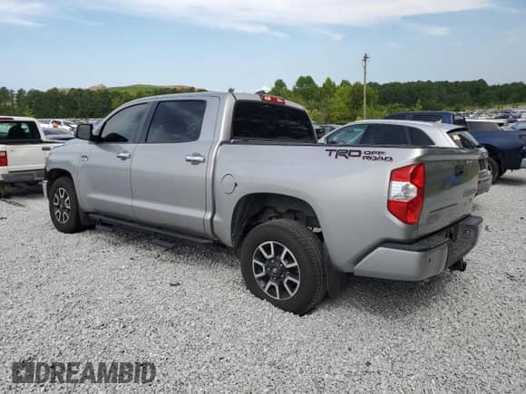 2020 Toyota Tundra Platinum с VIN 5TFGY5F17LX263151, выставлен на аукционе Copart как лот 65772464 с пробегом 104 218 миль миль и Списание • Salvage title. История ставок и продаж доступна на DreamBid. Изображение 2.