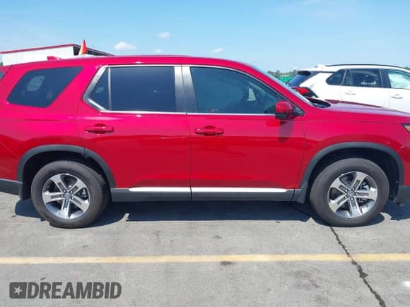 2025 Honda Pilot EX-L z VIN 5FNYG2H48SB025024, wystawiony jako IAAI lot #42438982 z przebiegiem 6 108 mil mil oraz . Historia ofert i sprzedaży dostępna na DreamBid. Obrazek 13.