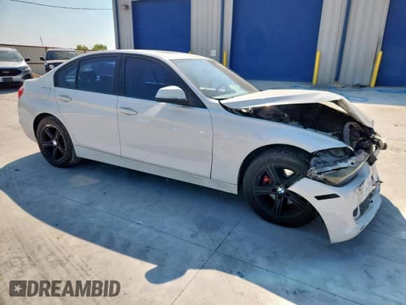 2014 BMW 3 Series 320i with VIN WBA3B1G55ENT01174, listed as a Copart auction lot 85941935 with 145,559 mi miles and Salvage title. Bid and sale history available at DreamBid. Image 4.