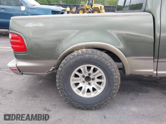 2002 Ford F-150 XLT с VIN 1FTRW08L42KE05595, выставлен на аукционе IAAI как лот 42108052 с пробегом Не указан миль и . История ставок и продаж доступна на DreamBid. Изображение 14.
