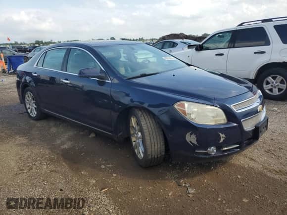 2011 Chevrolet Malibu LTZ with VIN 1G1ZE5E72BF121763, listed as a Copart auction lot 68934935 with 157,523 mi miles and Salvage title. Bid and sale history available at DreamBid. Image 4.