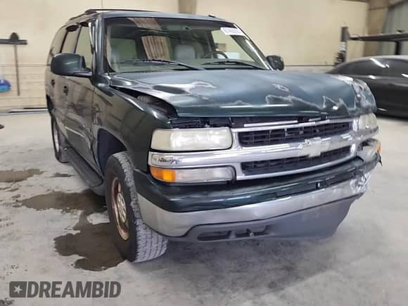 2003 Chevrolet Tahoe LT with VIN 1GNEC13Z63J118959, listed as a Copart auction lot 70187115 with 201,611 mi miles and Salvage title. Bid and sale history available at DreamBid. Image 14.
