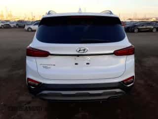 2020 Hyundai Santa Fe Limited with VIN 5NMS53AD1LH165881, listed as a Copart auction lot 70551872 with 24,357 mi miles and . Bid and sale history available at DreamBid. Image 6.