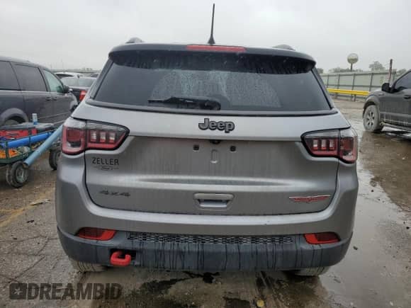 2019 Jeep Compass Trailhawk with VIN 3C4NJDDB7KT671080, listed as a Copart auction lot 60645655 with 131,581 mi miles and Salvage title. Bid and sale history available at DreamBid. Image 6.