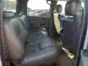 2005 Chevrolet Suburban LT z VIN 3GNEC16Z55G271476, wystawiony jako Copart lot #76740214 z przebiegiem Nie podano mil oraz Szkoda całkowita • Salvage title. Historia ofert i sprzedaży dostępna na DreamBid. Obrazek 11.