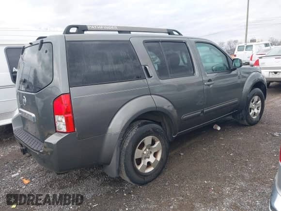 2005 Nissan Pathfinder SE with VIN 5N1AR18U55C760465, listed as a IAAI auction lot 41827578 with 236,946 mi miles and . Bid and sale history available at DreamBid. Image 4.