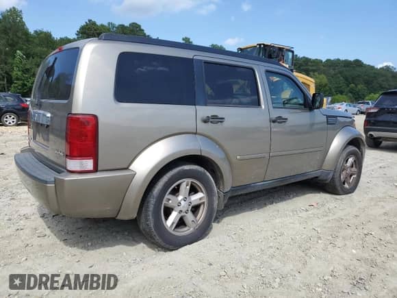 2007 Dodge Nitro SLT with VIN 1D8GU58K67W654483, listed as a Copart auction lot 67985915 with 170,229 mi miles and Salvage title. Bid and sale history available at DreamBid. Image 3.