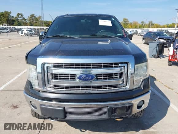 2013 Ford F-150 Lariat with VIN 1FTFW1ET3DKE67750, listed as a IAAI auction lot 43240995 with 159,269 mi miles and . Bid and sale history available at DreamBid. Image 12.