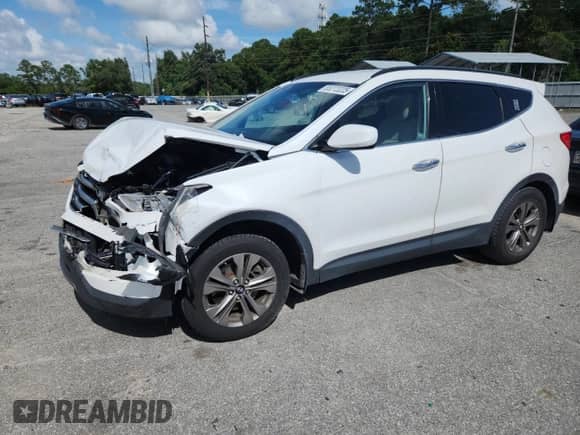 2016 Hyundai Santa Fe with VIN 5XYZU3LB2GG335212, listed as a Copart auction lot 65273225 with 107,801 mi miles and Salvage title. Bid and sale history available at DreamBid. Image 1.