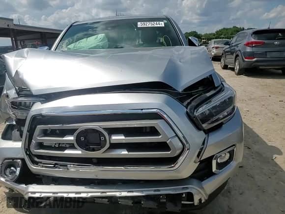 2023 Toyota Tacoma Limited с VIN 3TMEZ5CN5PM198548, выставлен на аукционе Copart как лот 59275244 с пробегом 27 057 миль миль и На запчасти • Non repairable. История ставок и продаж доступна на DreamBid. Изображение 10.