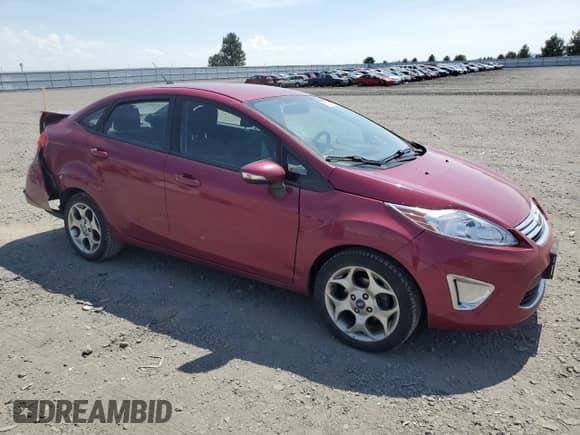 2011 Ford Fiesta SEL with VIN 3FADP4CJ4BM189377, listed as a Copart auction lot 66825165 with 123,558 mi miles and Salvage title. Bid and sale history available at DreamBid. Image 4.