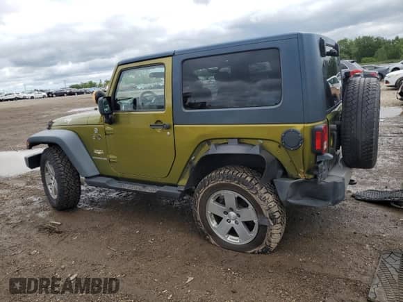 2008 Jeep Wrangler Sahara с VIN 1J4FA54148L579960, выставлен на аукционе Copart как лот 69604735 с пробегом 202 979 миль миль и Списание • Salvage title. История ставок и продаж доступна на DreamBid. Изображение 2.