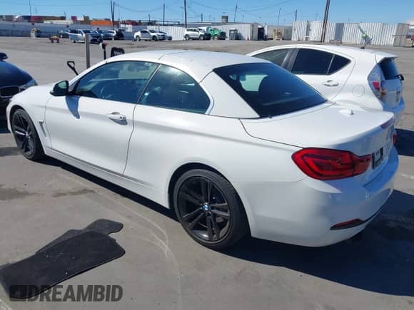 2018 BMW 4 Series 430i with VIN WBA4Z1C54JEC59132, listed as a IAAI auction lot 43185293 with 85,054 mi miles and . Bid and sale history available at DreamBid. Image 3.