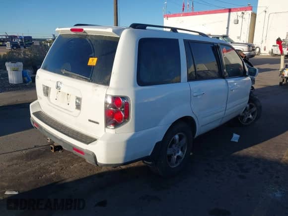 2007 Honda Pilot EX z VIN 2HKYF184X7H519875, wystawiony jako IAAI lot #43422713 z przebiegiem Nie podano mil oraz . Historia ofert i sprzedaży dostępna na DreamBid. Obrazek 4.