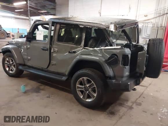 2022 Jeep Wrangler Unlimited Sahara with VIN 1C4HJXENXNW251089, listed as a IAAI auction lot 41728817 with 48,438 mi miles and . Bid and sale history available at DreamBid. Image 3.