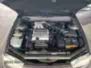 1992 Toyota Camry z VIN JT2VK12E3N0015025, wystawiony jako Copart lot #55521815 z przebiegiem 176 104 mil mil oraz Szkoda całkowita • Salvage title. Historia ofert i sprzedaży dostępna na DreamBid. Obrazek 11.