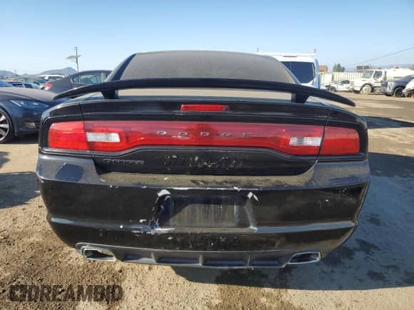 2013 Dodge Charger SE z VIN 2C3CDXBG4DH688157, wystawiony jako Copart lot #43281185 z przebiegiem 111 887 mil mil oraz Czysty tytuł • Clean title. Historia ofert i sprzedaży dostępna na DreamBid. Obrazek 6.