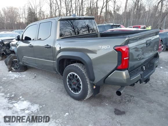 2024 Toyota Tacoma SR5 with VIN 3TMLB5JN9RM046175, listed as a IAAI auction lot 41006597 with 6,139 mi miles and . Bid and sale history available at DreamBid. Image 3.