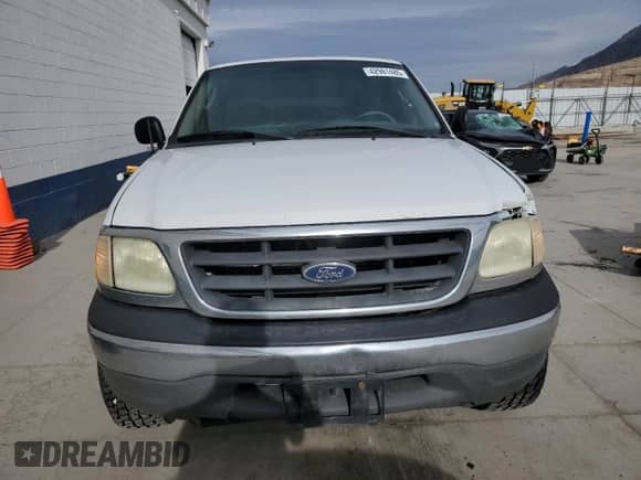 2003 Ford F-150 XL z VIN 2FTRF18W53CA04398, wystawiony jako Copart lot #42981485 z przebiegiem 244 706 mil mil oraz Szkoda całkowita • Salvage title. Historia ofert i sprzedaży dostępna na DreamBid. Obrazek 5.