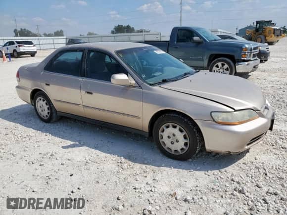 2001 Honda Accord LX z VIN 1HGCG56471A080636, wystawiony jako Copart lot #80106635 z przebiegiem 138 845 mil mil oraz Czysty tytuł • Clean title. Historia ofert i sprzedaży dostępna na DreamBid. Obrazek 4.