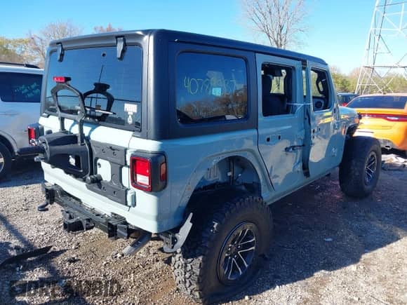 2024 Jeep Wrangler Willys with VIN 1C4RJXDNXRW135984, listed as a IAAI auction lot 40789537 with 6,609 mi miles and . Bid and sale history available at DreamBid. Image 4.