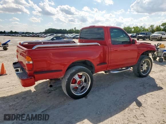 2004 Toyota Tacoma PreRunner with VIN 5TENM92N74Z464206, listed as a Copart auction lot 84038115 with 217,428 mi miles and Salvage title. Bid and sale history available at DreamBid. Image 3.