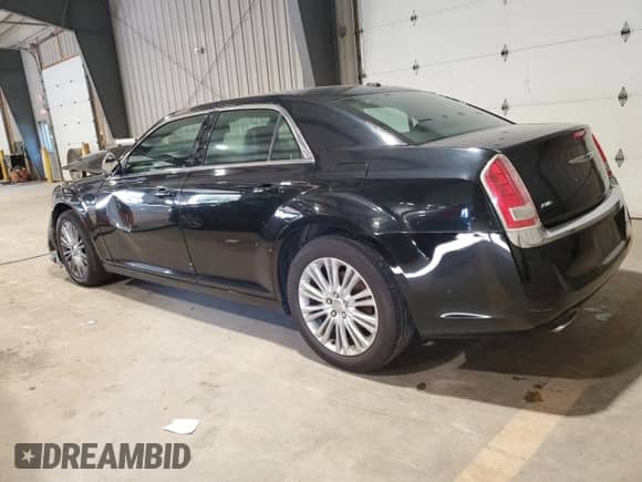 2014 Chrysler 300 с VIN 2C3CCARG4EH341905, выставлен на аукционе Copart как лот 81910835 с пробегом 188 749 миль миль и Списание • Salvage title. История ставок и продаж доступна на DreamBid. Изображение 2.