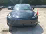 2022 Tesla Model Y Long Range with VIN 7SAYGDEE9NF455340, listed as a Copart auction lot 66966654 with 22,707 mi miles and Salvage title. Bid and sale history available at DreamBid. Image 5.