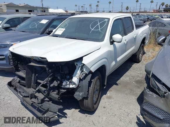 2023 Nissan Frontier SV with VIN 1N6ED1FKXPN650697, listed as a IAAI auction lot 42289020 with 19,715 mi miles and . Bid and sale history available at DreamBid. Image 2.