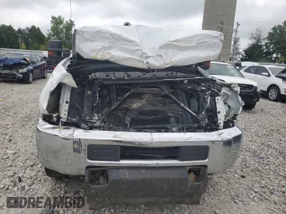 2018 Chevrolet Silverado 2500HD Work Truck z VIN 1GC1KUEG8JF176160, wystawiony jako Copart lot #69450375 z przebiegiem Nie podano mil oraz Szkoda całkowita • Salvage title. Historia ofert i sprzedaży dostępna na DreamBid. Obrazek 5.