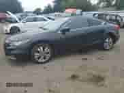 2012 Honda Accord LX-S with VIN 1HGCS1B38CA003281, listed as a Copart auction lot 69586325 with 145,856 mi miles and Salvage title. Bid and sale history available at DreamBid. Image 1.