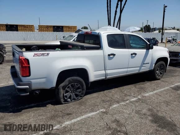 2021 Chevrolet Colorado 4WD Z71 with VIN 1GCGTDEN5M1238797, listed as a Copart auction lot 66071325 with 27,604 mi miles and Salvage title. Bid and sale history available at DreamBid. Image 3.