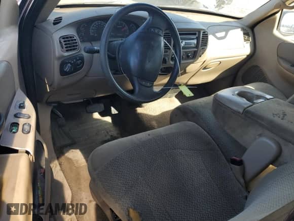 2000 Ford F-150 XL with VIN 1FTRX18W0YKA46560, listed as a Copart auction lot 46865705 with 237,884 mi miles and Salvage title. Bid and sale history available at DreamBid. Image 8.