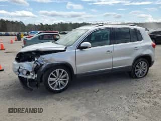 2012 Volkswagen Tiguan S с VIN WVGAV7AX1CW557510, выставлен на аукционе Copart как лот 84183995 с пробегом 200 842 миль миль и Списание • Salvage title. История ставок и продаж доступна на DreamBid. Изображение 1.
