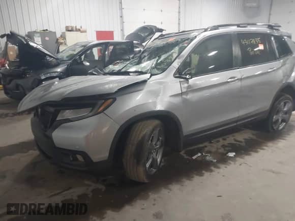 2019 Honda Passport Touring with VIN 5FNYF8H92KB011685, listed as a IAAI auction lot 43117835 with Not provided miles and . Bid and sale history available at DreamBid. Image 16.