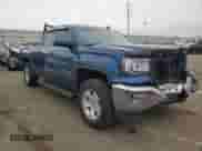 2019 GMC Sierra 1500 SLE with VIN 2GTV2MEC8K1209200, listed as a Copart auction lot 79260914 with 120,568 mi miles and Salvage title. Bid and sale history available at DreamBid. Image 4.