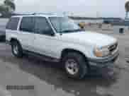 1998 Ford Explorer XL z VIN 1FMZU32EXWZB41566, wystawiony jako IAAI lot #42519853 z przebiegiem 301 846 mil mil oraz . Historia ofert i sprzedaży dostępna na DreamBid. Obrazek 1.