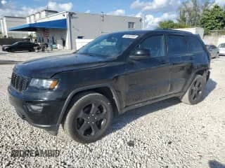 2018 Jeep Grand Cherokee Laredo E with VIN 1C4RJFAG6JC382151, listed as a Copart auction lot 84907855 with 122,140 mi miles and Salvage title. Bid and sale history available at DreamBid. Image 1.