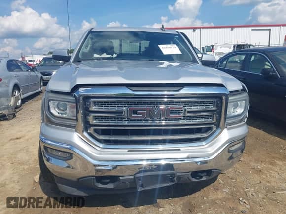2016 GMC Sierra 1500 SLE with VIN 1GTV2MEC0GZ152957, listed as a IAAI auction lot 42850174 with 122,974 mi miles and . Bid and sale history available at DreamBid. Image 13.
