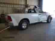 2020 Ram 1500 Tradesman with VIN 3C6JR6DT9LG189823, listed as a Copart auction lot 77557314 with 64,279 mi miles and Salvage title. Bid and sale history available at DreamBid. Image 3.