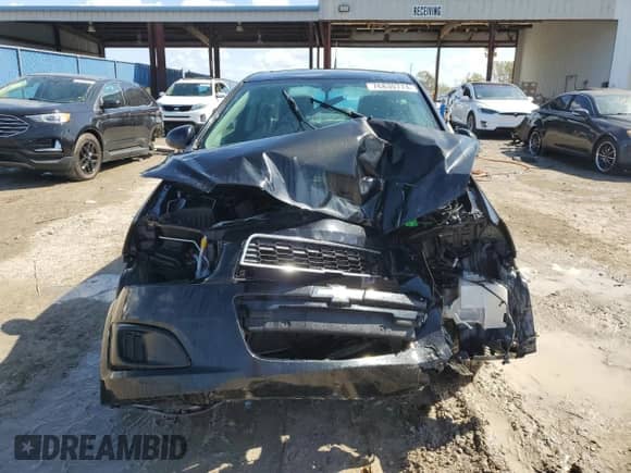 2014 Chevrolet Sonic LS с VIN 1G1JB5SH6E4186604, выставлен на аукционе Copart как лот 76830774 с пробегом Не указан миль и На запчасти • Non repairable. История ставок и продаж доступна на DreamBid. Изображение 5.